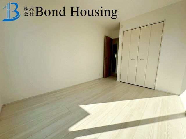 「商業施設徒歩9分」「4LDK」二見町西二見 A号棟の寝室