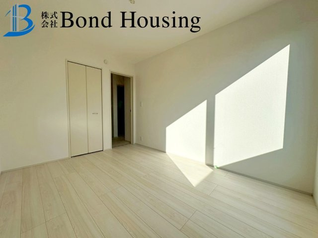 「商業施設徒歩9分」「4LDK」二見町西二見 A号棟の寝室