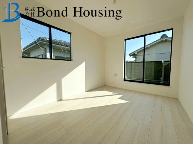 「商業施設徒歩9分」「4LDK」二見町西二見 A号棟の寝室