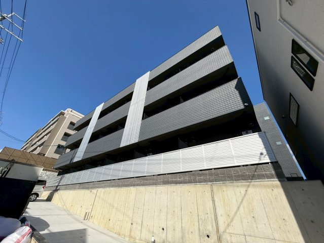 プルメリア阪大前の外観