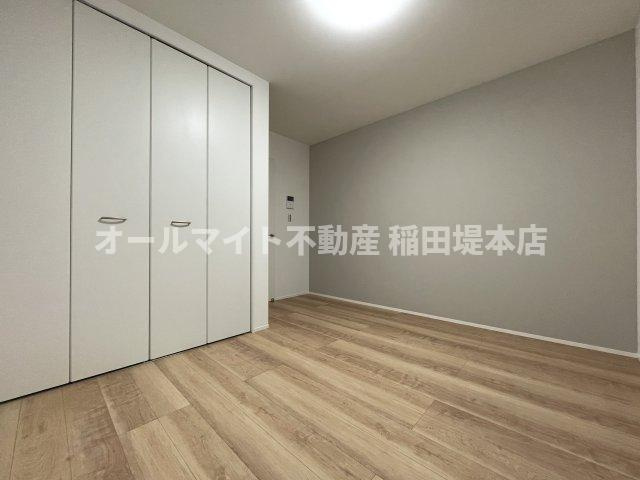 川崎市多摩区西生田１丁目のアパートの寝室