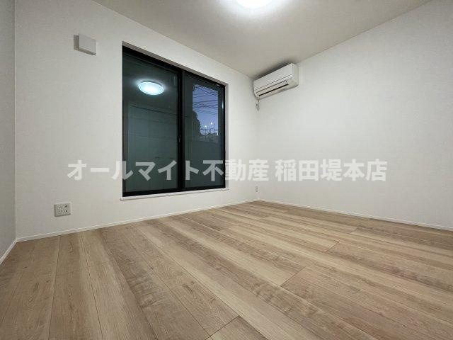 川崎市多摩区西生田１丁目のアパートの居間・リビング