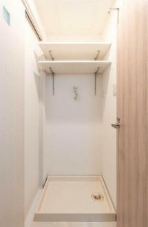 【設備】 | コーヨービル | 室内洗濯機置場。