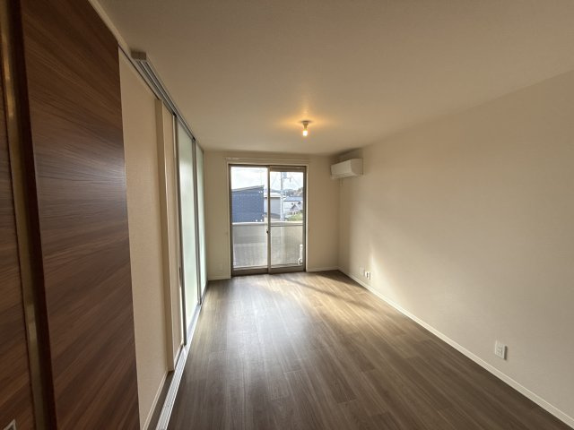 カーサグラスオエステB棟の居間・リビング