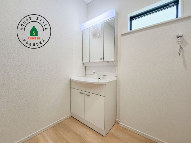 糟屋郡須恵町佐谷第1-2棟（1号棟）の内観：施工例|洗面所は小さなプライベートスペース。歯磨き、洗顔と毎日施す個人空間。