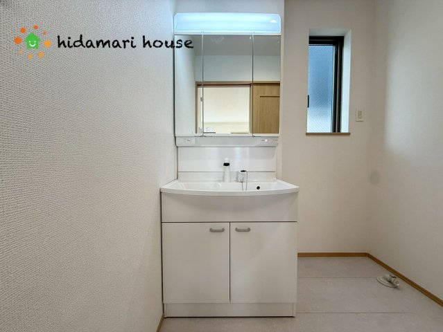 西区佐知川412　新築戸建　ハートフルタウンAの独立洗面台