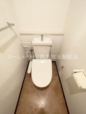 大阪市城東区古市１丁目の賃貸マンションのトイレ