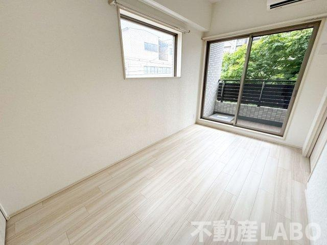 プレジオ難波ASIANの寝室