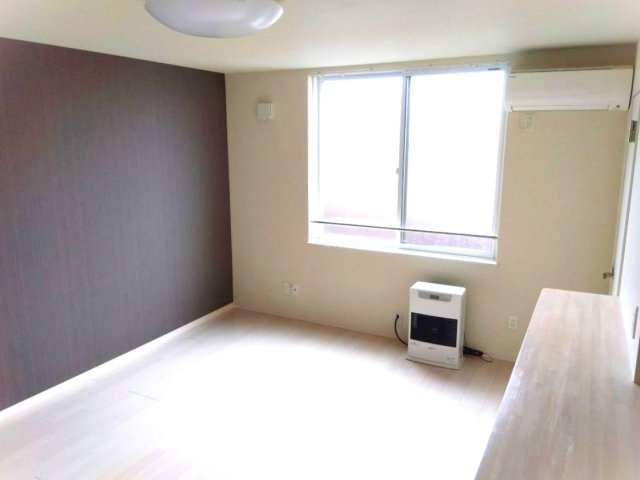 クレアージュ江陽Aの居間・リビング