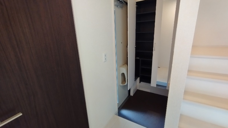 ルミエールＳ（竜美）の玄関