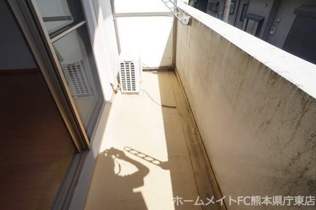 熊本市南区出仲間８丁目の賃貸マンションのバルコニー