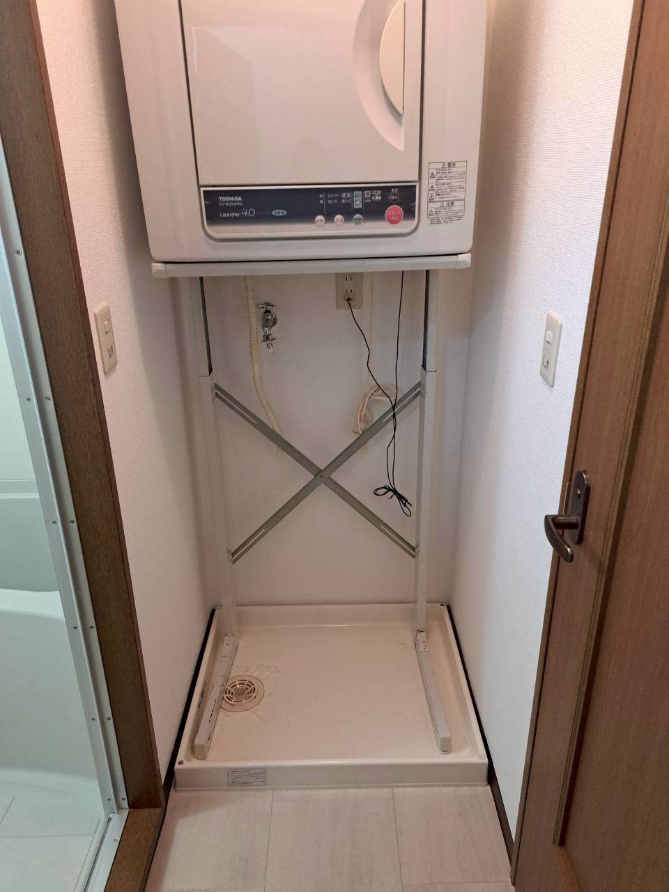 グリッドの玄関|乾燥機は残置物