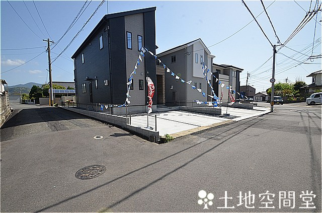 北九州市八幡西区中の原3丁目3期1号棟の前面道路含む現地写真