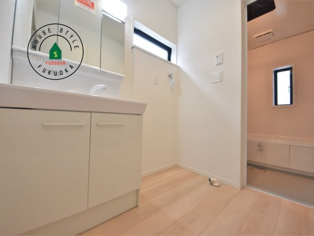 糟屋郡新宮町緑ヶ浜2丁目第2-2棟（1号棟）の内観：施工例|脱衣所、洗面所は小さなプライベートスペース。歯磨き、洗顔と毎日施す個人空間。