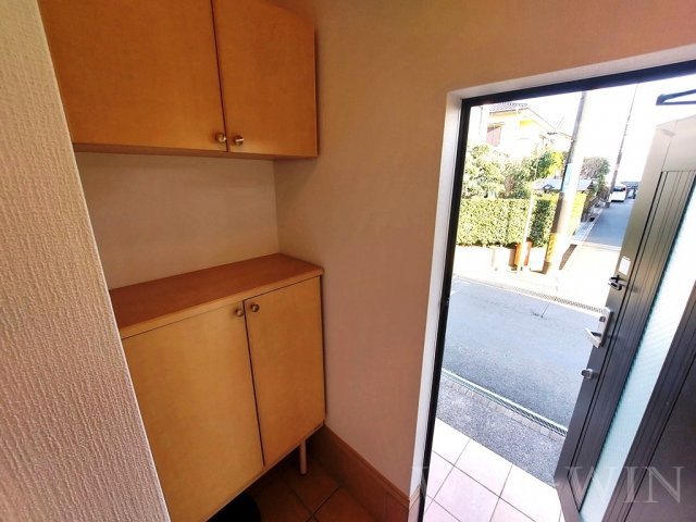 プラッサムコートMK A棟の玄関