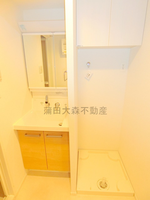 GRAN　PASEO大森北の洗面所|独立洗面台と室内洗濯機置き場