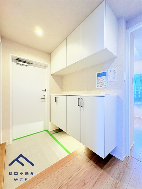 ネクサス香椎セントラルガーデンイースト2号棟の玄関