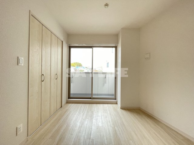 アルカンシェルコート緑橋の洋室