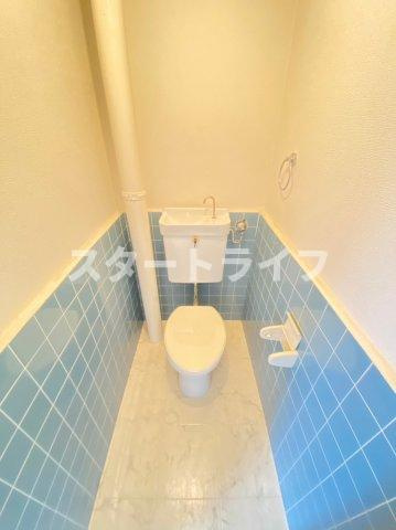 大阪市淀川区木川西１丁目の賃貸マンションのトイレ