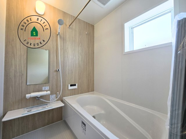 粕屋郡篠栗町田中4丁目第3-1棟（1号棟）の内観：施工例|1日の疲れを癒してくれる広々バスルーム。雨の日のお洗濯にも大活躍な浴室乾燥機付です！