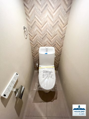 【オーナーチェンジ】丸美シャトー大須　中区大須２丁目のトイレ|落ち着いた色合いの内装で清潔感あるトイレ