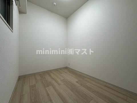 プレサンス堺筋本町エグゼブランの洋室