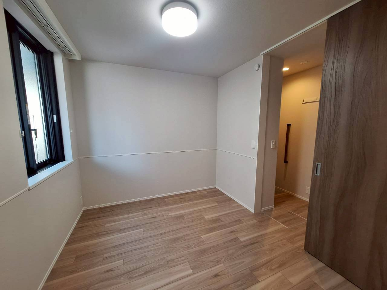 グランレガロ新高円寺の寝室