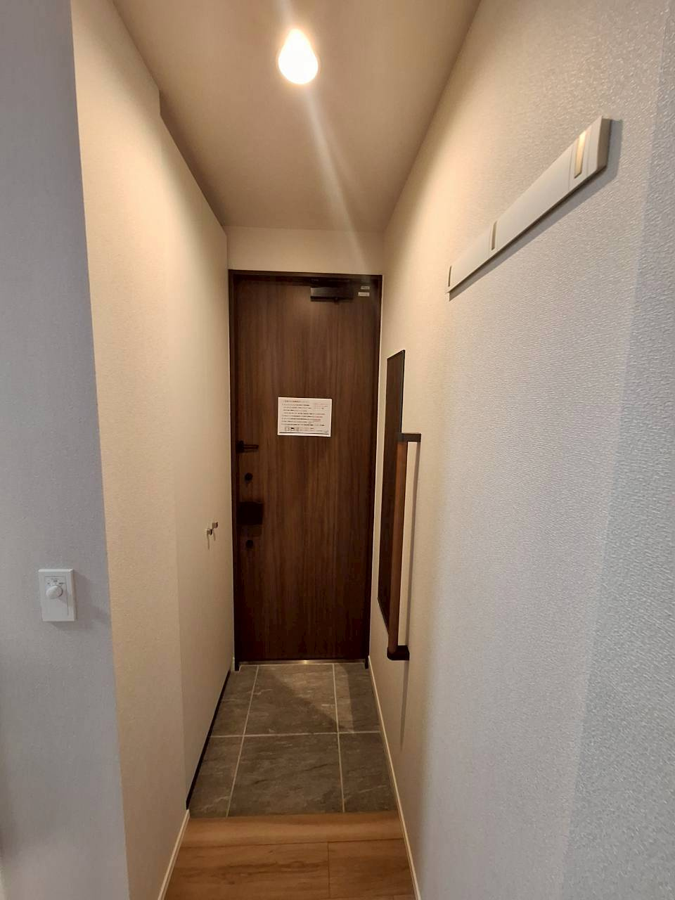 グランレガロ新高円寺の玄関