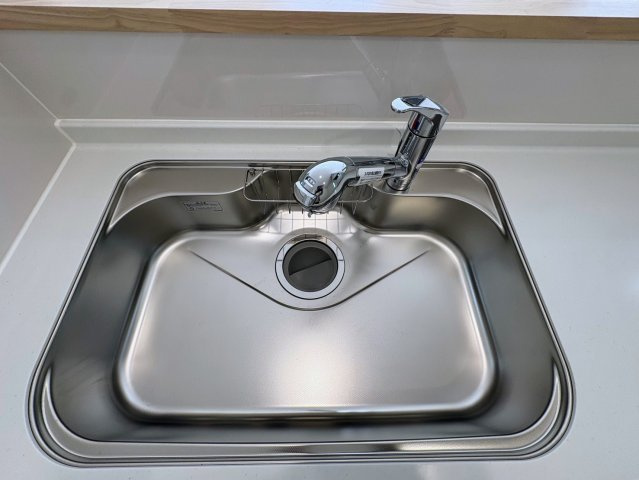 クレイドルガーデン糸満市大度 第1・２号棟のキッチン|浄水器付きキッチンの流し台