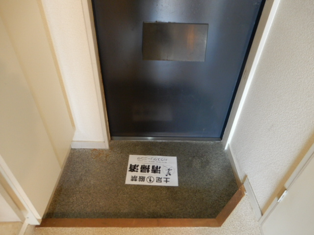 グリーンハイツ王塚台の玄関