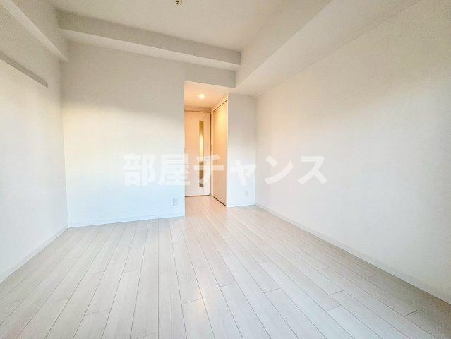 プレサンス名古屋STATIONキュオルの寝室