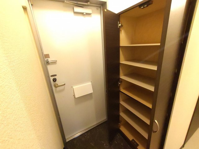 レオネクストＴｏｍａⅠの玄関