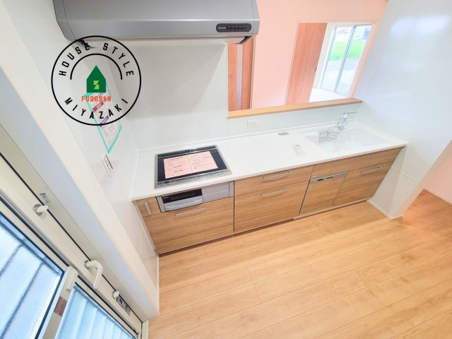 宮崎市吉村町3(1号棟)の内観：施工例|ご家族を近くに感じられる対面キッチンのLDK。会話もはずみそうですね。