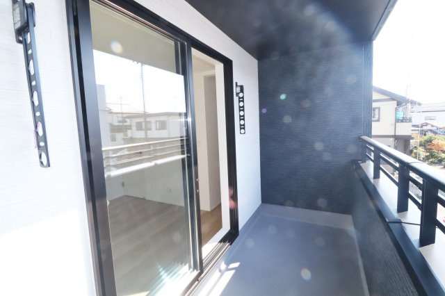 郡山市富田町字坦ノ腰　　　１号棟　　富田小学校、富田中学区のバルコニー