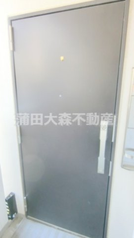 ビーシティアパートメント東京サウスの玄関