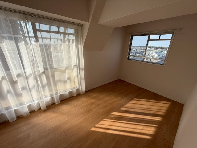 ネオハイツ森林公園Aの洋室