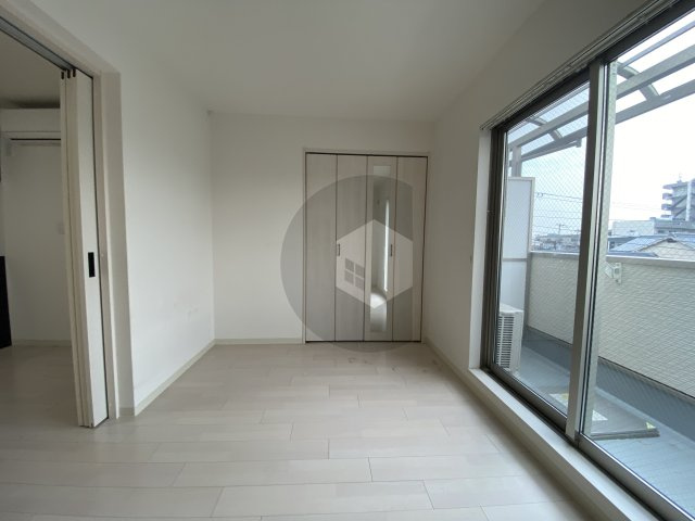 クリエオーレ高井田西の寝室