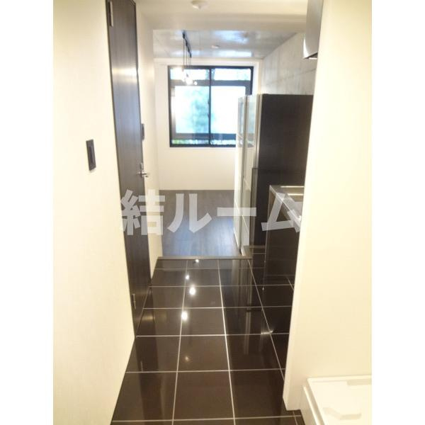 文京区本駒込１丁目の賃貸マンションの玄関