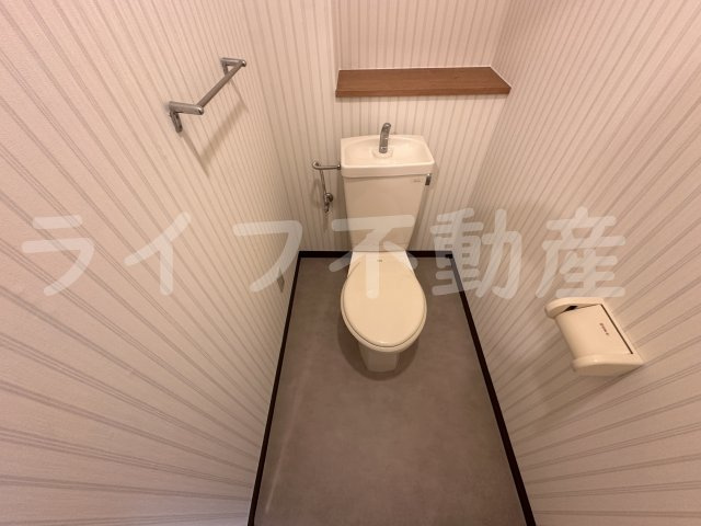 ポプルスONEのトイレ|落ち着いた色調のトイレです