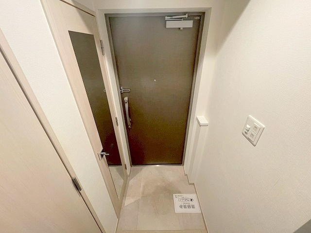 プレサンス神崎川ファインブレスの玄関