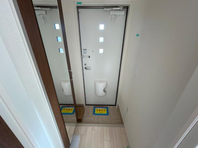 ウィズダム　コートの玄関|洋室