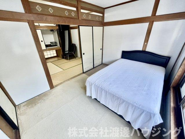 新高5丁目戸建の寝室