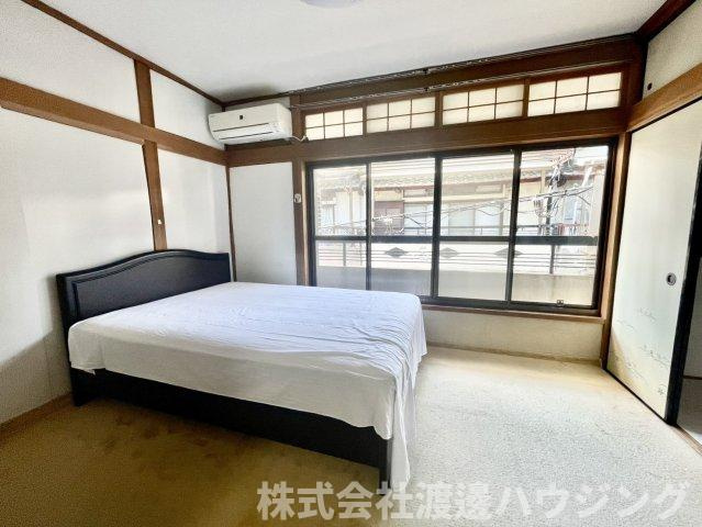 新高5丁目戸建の寝室