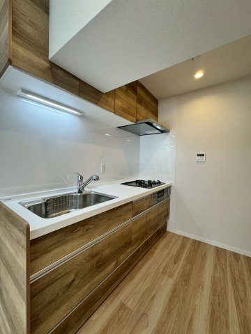 寝屋川コーポラスのキッチン|木目調のキッチンでお洒落なキッチンです。