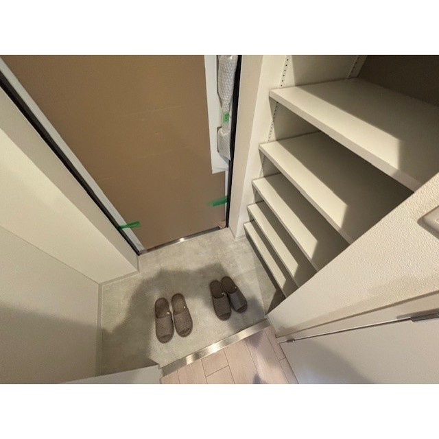 ブロード塚本駅前レジデンスの玄関