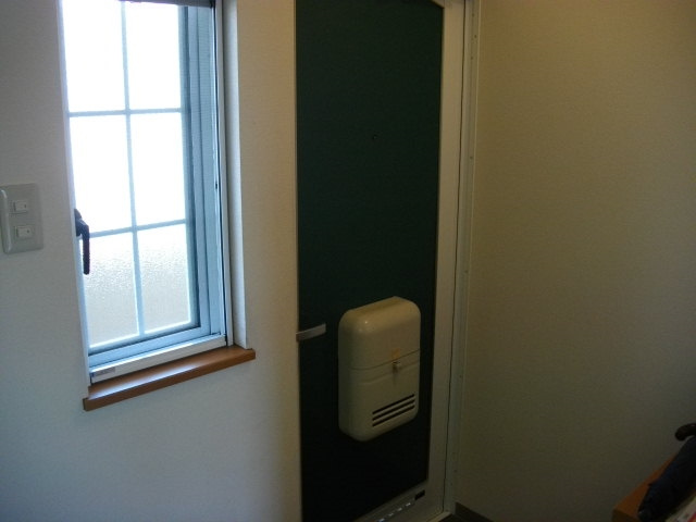 パストラルコートＨ棟の玄関