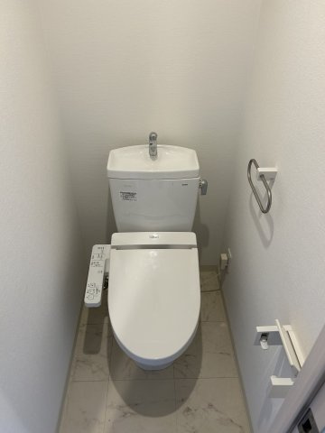 大阪市淀川区塚本５丁目の賃貸マンションのトイレ