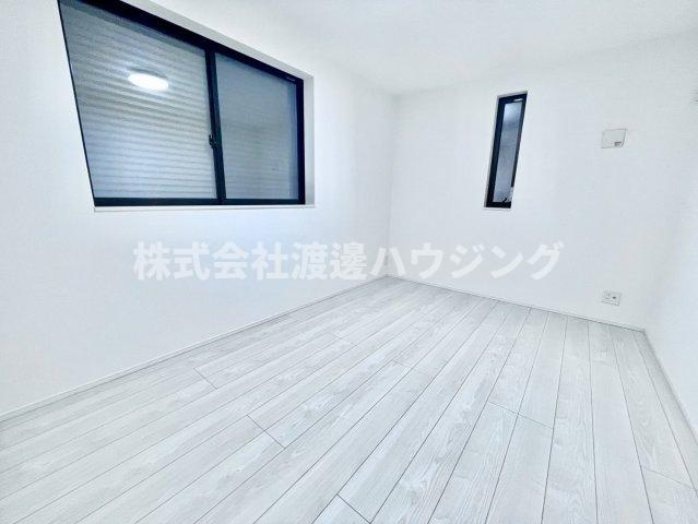 六軒町戸建ての寝室