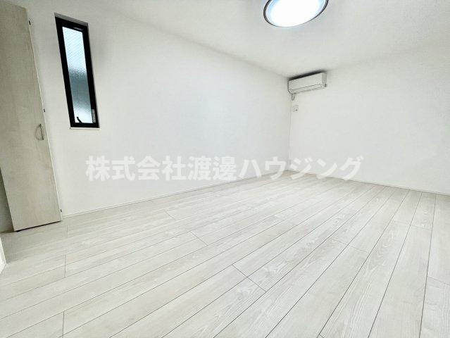 六軒町戸建ての寝室