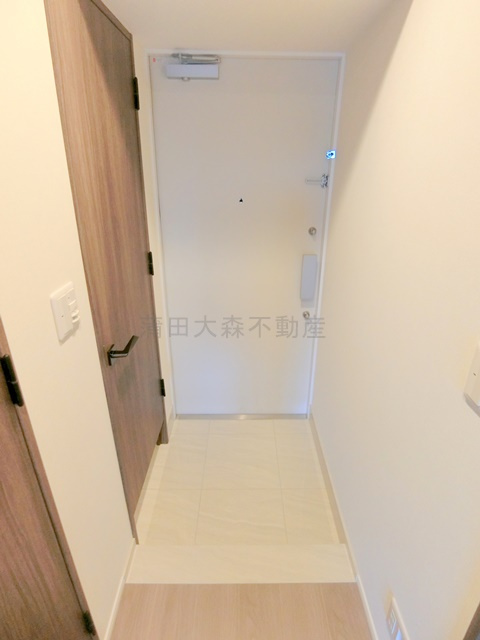 プレディアコート大森山王プレディアコートオオモリサンノウの玄関